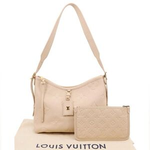 Louis Vuitton Monogram Empreinte Leather Carryall PM  Off White With Pouch